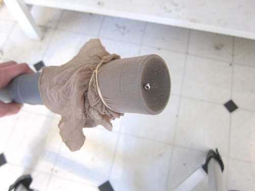 Clever idea: stocking over vacuum to pick up lost items