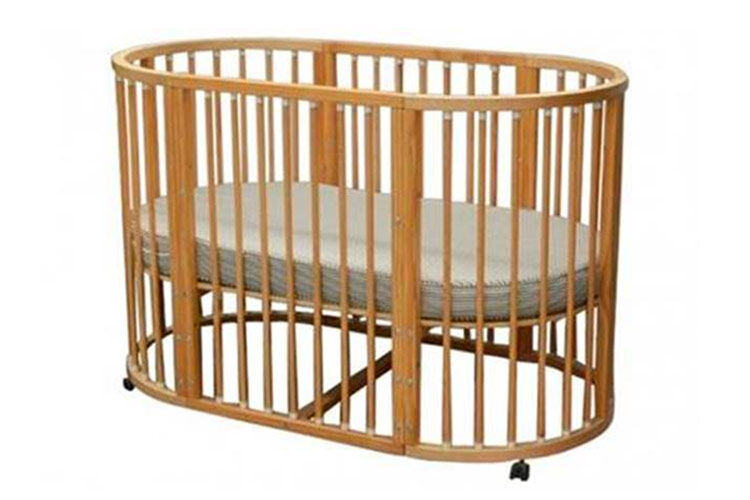 oval cot bed