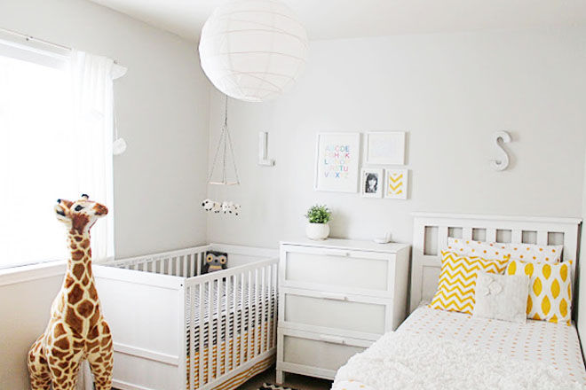 crib and toddler bed in small room