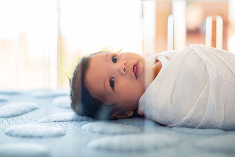 Tips for safely setting up a cot Mum's Grapevine