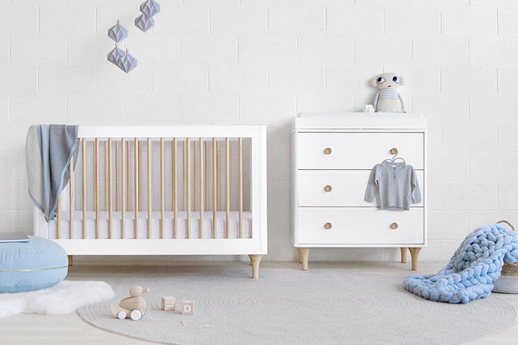white and timber cot